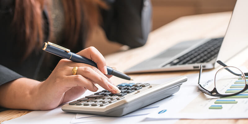 Woman On Calculator