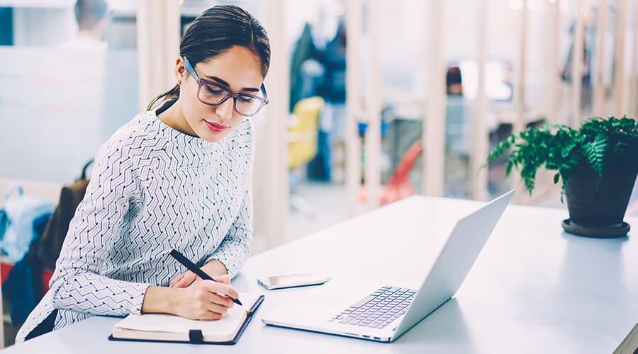 Woman Completing Paperwork