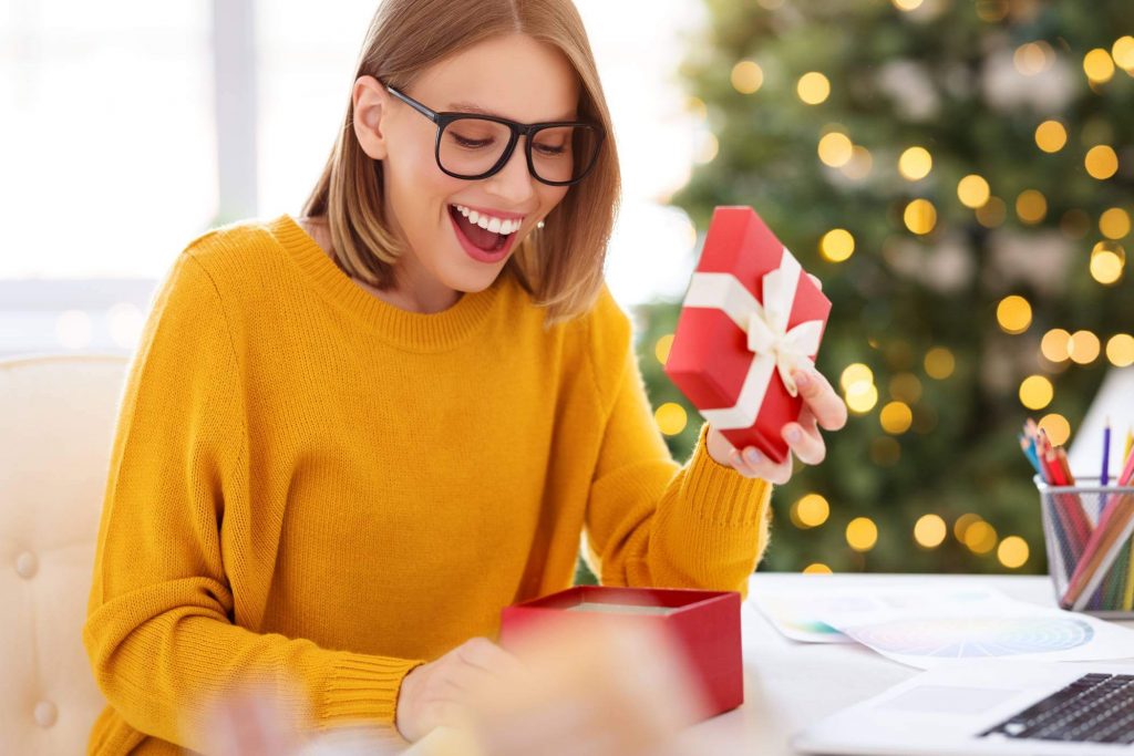 Woman Opening Gift