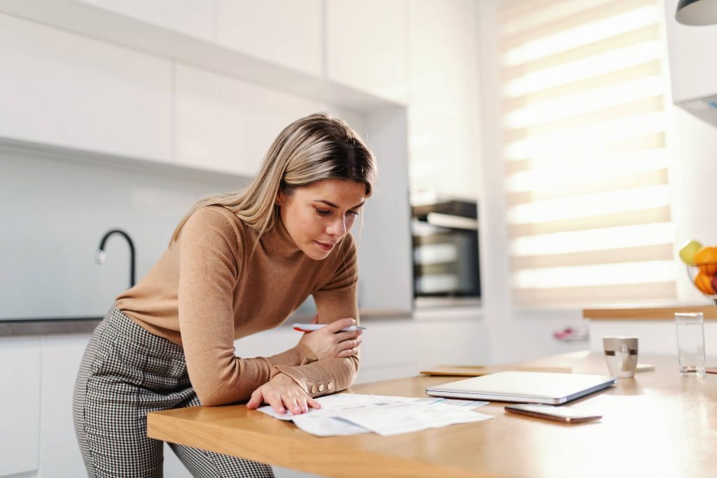 Woman Filling Out Forms