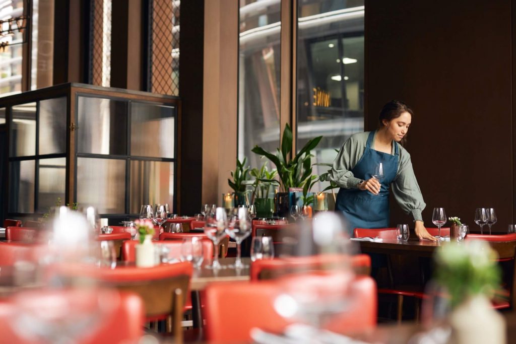 Waitress Setting Tables