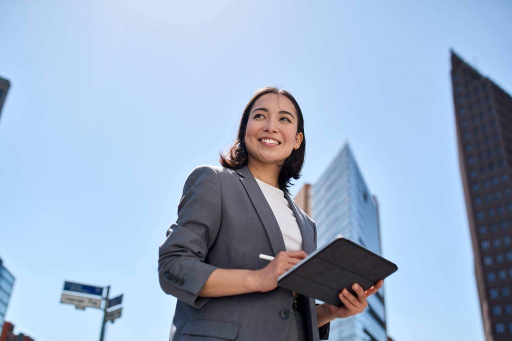 Young Corporate Woman On Tablet