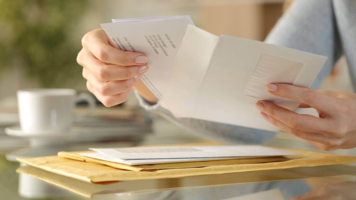 Woman Opening Letter