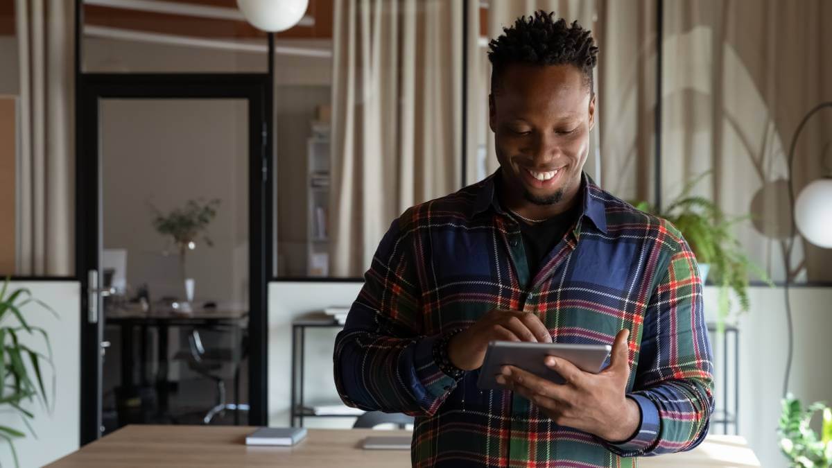 Young Man On Tablet