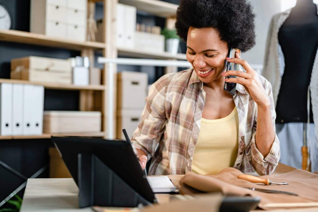 Female Business Owner On The Phone