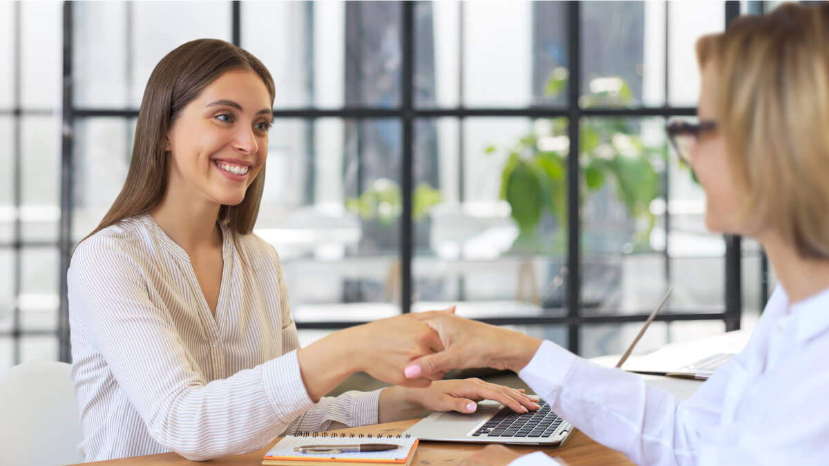 Women shaking hands