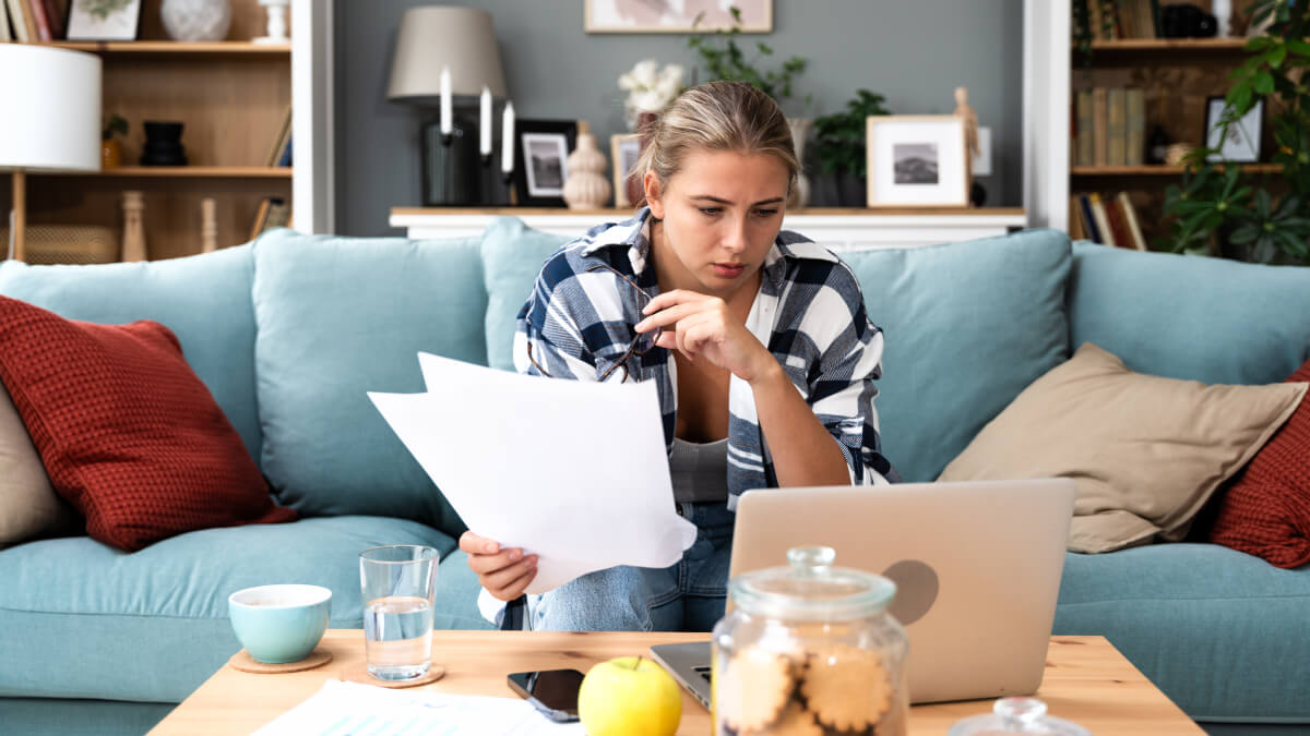Woman assessing her finances
