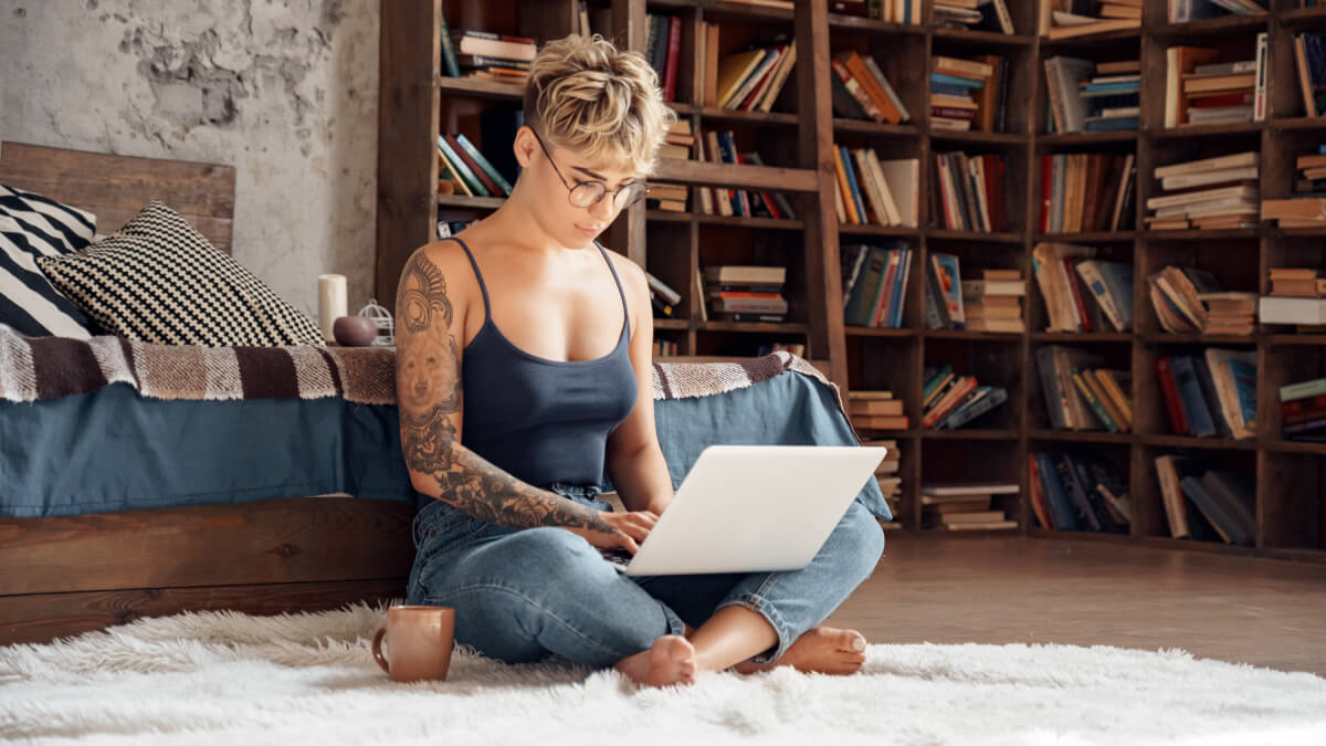 Woman looking at laptop