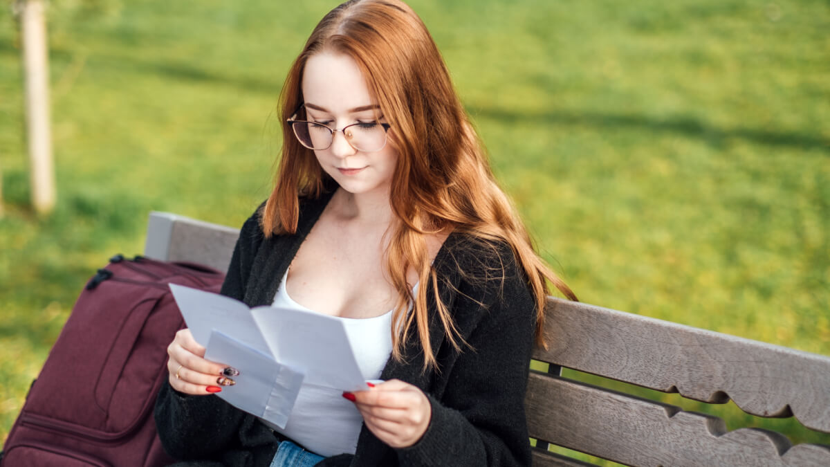 Young Woman looking at paper