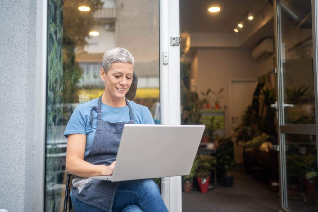 Business owner on laptop