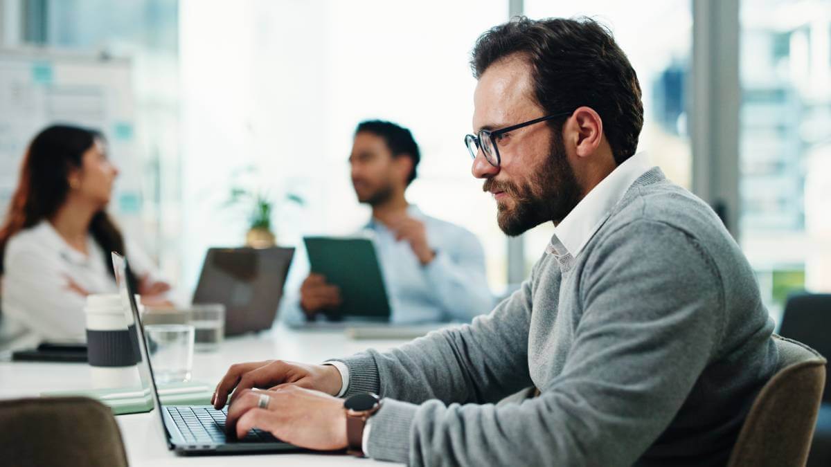 man working on laptop